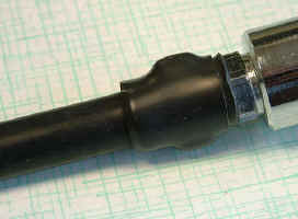 Ohrklemme mit Schrumpfschlauch